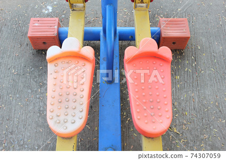 exercises at street workout place in summer morning. Healthy lifestyle sport concept exercises at street workout place in summer morning. Healthy lifestyle sport concept 74307059