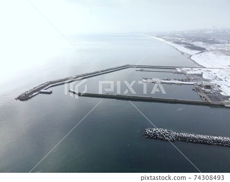Aerial view of snow scene at Daichu fishing port in Oshamambe-cho, Hokkaido in winter Aerial view of snow scene at Daichu fishing port in Oshamambe-cho, Hokkaido in winter 74308493