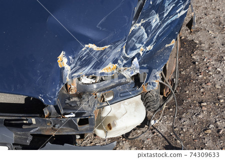 blue car after an accident blue car after an accident 74309633