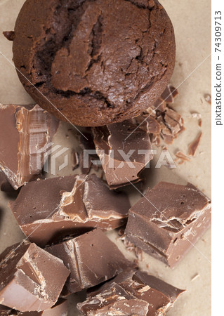 pieces of large natural real chocolate and chocolate cake pieces of large natural real chocolate and chocolate cake 74309713
