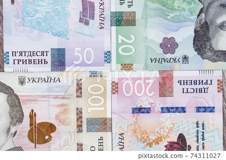 Paper money different denominations, Ukrainian hryvnia in denominations 50,100, 200 hryvnias, new money 74311027