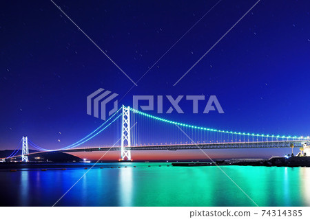 Light trails of Akashi Kaikyo Bridge and International Space Station 74314385