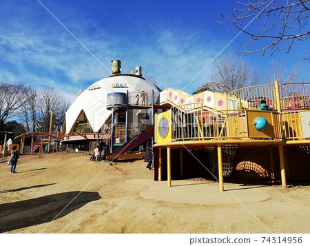 Children playing with big playground equipment in the forest park Children playing with big playground equipment in the forest park 74314956