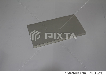 school notebook on a white background, notepad on school notebook on a white background, notepad on 74315295