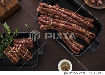 Dried Intestines in Black Plate Dried Intestines in Black Plate 74315490
