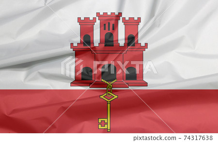 Fabric flag of Gibraltar. Crease of Gibraltar flag background Fabric flag of Gibraltar. Crease of Gibraltar flag background 74317638