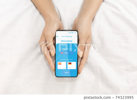 Unrecognizable Lady Learning Foreign Languages Online In Mobile Application On Smartphone 74323995