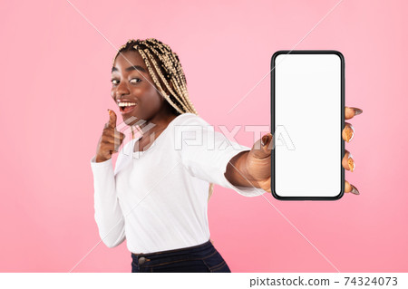 Black woman showing blank smartphone screen for mockup 74324073