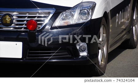 The front part of the police car The front part of the police car 74324104