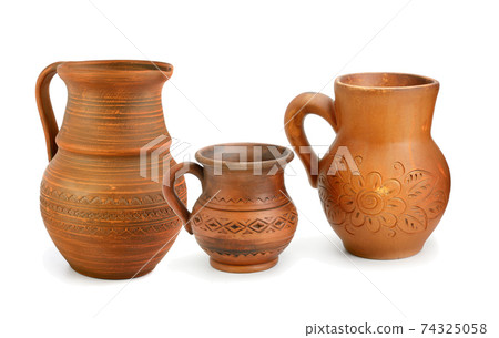 Set of old ceramic pot and mug isolated on white background. 74325058