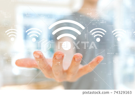 Wifi theme with young man 74329163