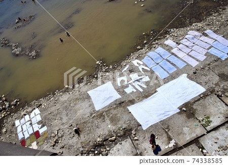 Laundry on the Ganges in Haridwar, India Laundry on the Ganges in Haridwar, India 74338585