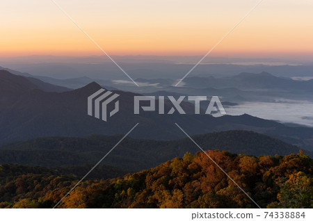 Mountain and sunrise. Mountain and sunrise. 74338884
