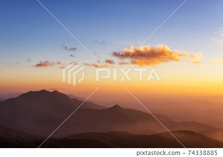 Mountain and sunset. Mountain and sunset. 74338885