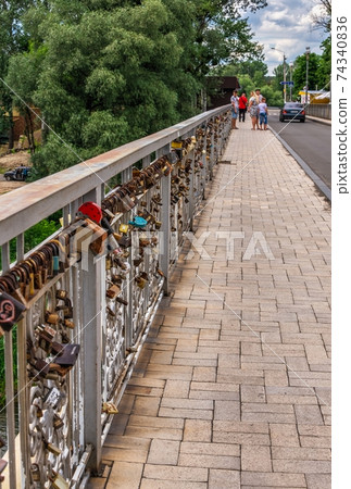 Svyatogorsk bridge near the Lavra in Svyatogorsk, Ukraine 74340836