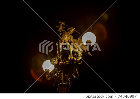 beautiful central lantern with bronze statue of Saint Michael 74340997