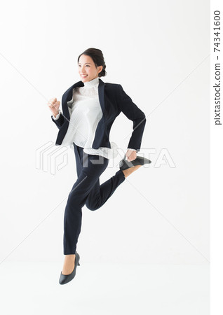 Women in their 20s jumping business Women in their 20s jumping business 74341600