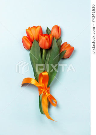 Hot orange bouquet of tulips Hot orange bouquet of tulips 74341630