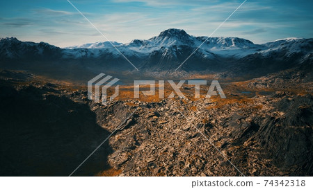 mountains with snow and dry hills in Chile 74342318