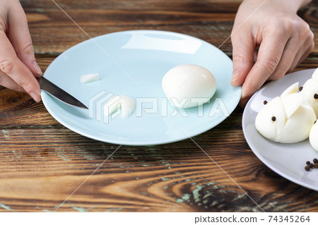 DIY instruction. Step by step guide. Making a funny rabbit from boiled eggs, decorating the Easter table, Easter decor and serving DIY instruction. Step by step guide. Making a funny rabbit from boiled eggs, decorating the Easter table, Easter decor and serving 74345264