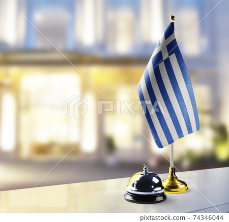 Greece flag on the reception desk in the lobby of the hotel 74346044