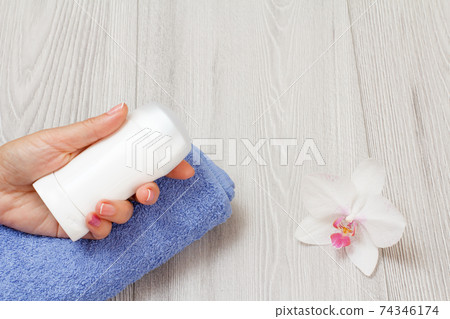 Women perfumers and cosmetics on a wooden background. Women perfumers and cosmetics on a wooden background. 74346174