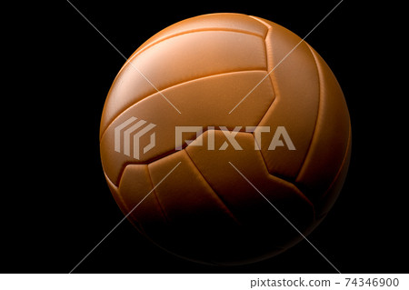 Leather handball ball or football on black background Leather handball ball or football on black background 74346900