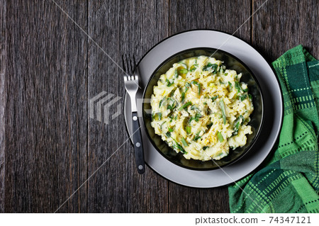 Irish colcannon on a black plate, copy space Irish colcannon on a black plate, copy space 74347121