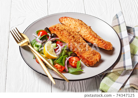 Panko crusted baked salmon fillets, veggies salad 74347125