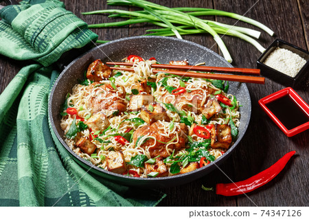 Sweet and sour tofu, chicken, and wok noodles Sweet and sour tofu, chicken, and wok noodles 74347126