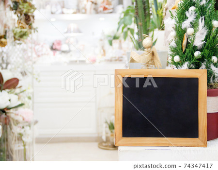 Flower shop with blank chalkboard Flower shop with blank chalkboard 74347417