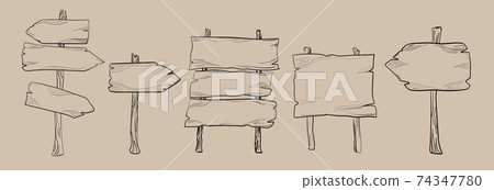 Set of wooden street signs and arrows. Isolated hand drawings on a light yellow background. 74347780