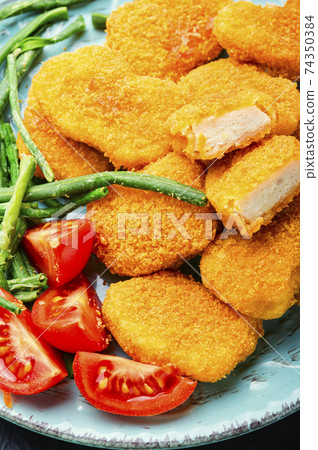 Nuggets with vegetables Nuggets with vegetables 74350384