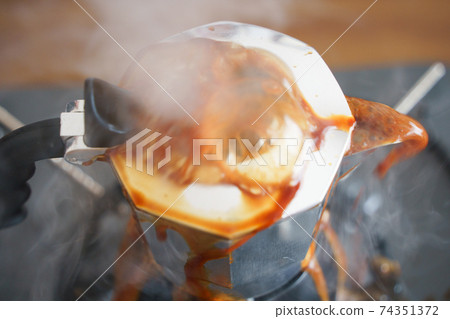 Coffee spilling from Makinetta Coffee spilling from Makinetta 74351372