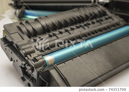 worn out photoreceptor on a laser printer cartridge lying on a service center table worn out photoreceptor on a laser printer cartridge lying on a service center table 74351709