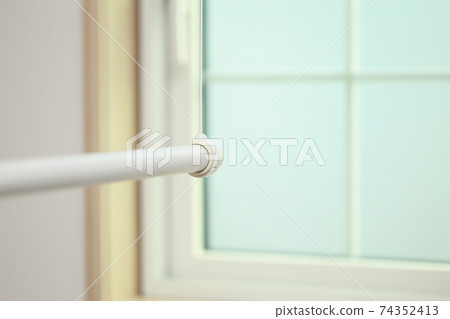 A rod for indoor drying at a dressing room 74352413