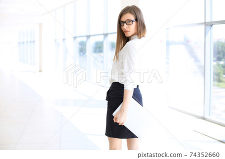 Portrait of modern business woman in the office 74352660