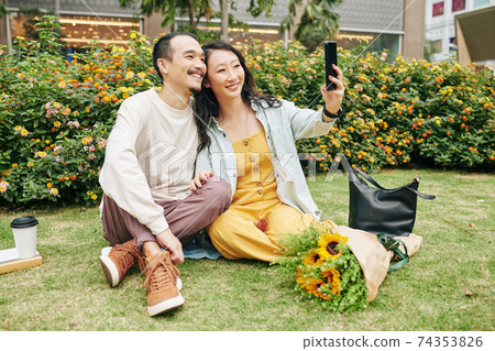Couple in love taking selfie Couple in love taking selfie 74353826
