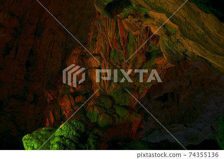 Stalactite and stalagmite formations in a limestone cave of Halong Bay, Stalactite and stalagmite formations in a limestone cave of Halong Bay, 74355136