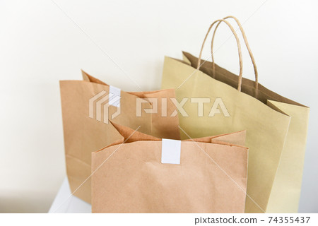 Disposable eco friendly packaging with craft paper shopping bag food to home, Service food order online delivery food box take away boxes. 74355437