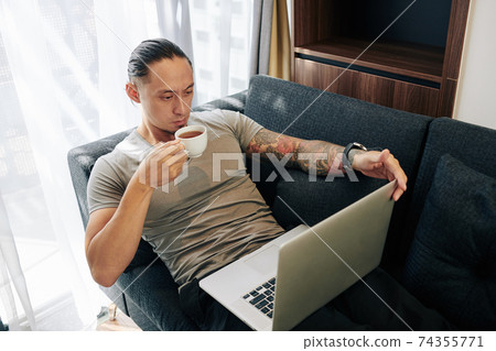 Man working from home 74355771