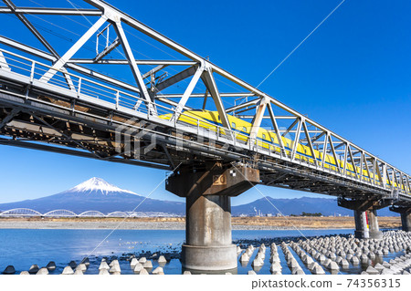 Doctor Yellow crossing the Fuji River with Mt. Fuji in the background Doctor Yellow crossing the Fuji River with Mt. Fuji in the background 74356315