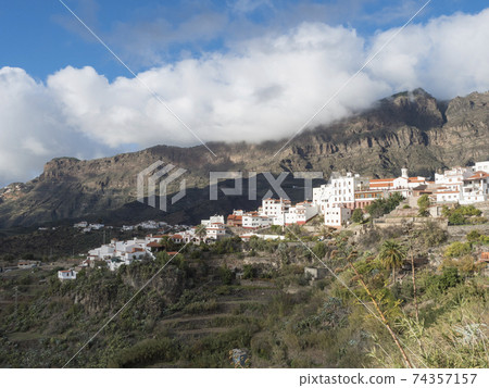 Picturesque Canarian village Tejeda in mountain valley scenery and view of bentayga rock Gran Canaria, Canary Islands, Spain 74357157