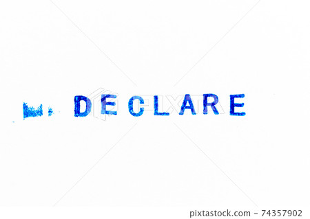 Blue color ink of rubber stamp in word declare on white paper background Blue color ink of rubber stamp in word declare on white paper background 74357902