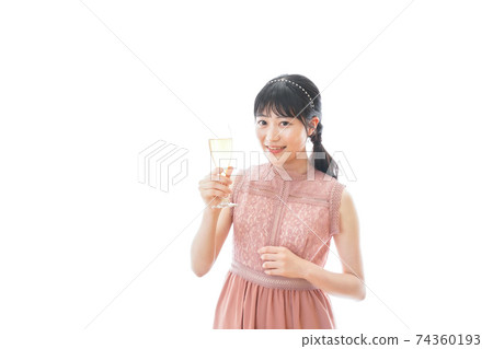 Young woman drinking wine at a party 74360193