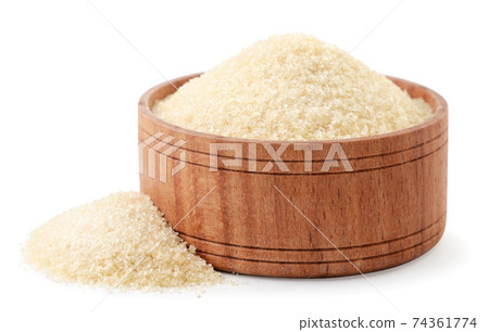 Dry gelatin granules in a wooden bowl on a white background. Isolated Dry gelatin granules in a wooden bowl on a white background. Isolated 74361774