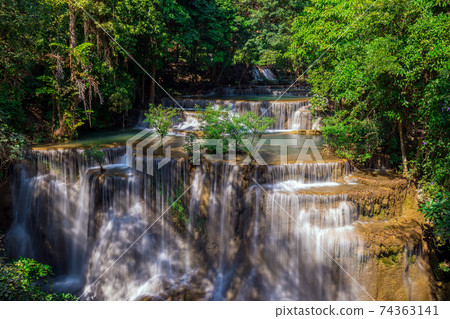Huay Maekamin Waterfall Tier 4 (Chatkaew) in Kanchanaburi, Thailand; photo by long exposure 74363141