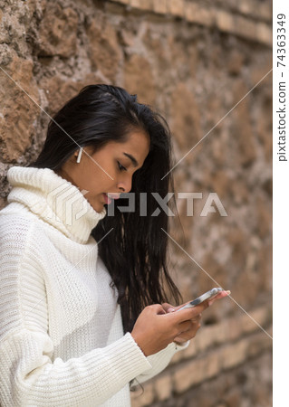 Choosing music from smartphone Choosing music from smartphone 74363349