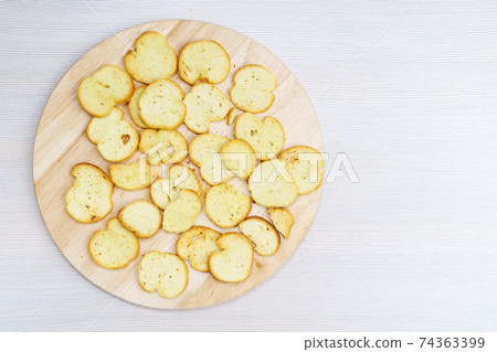 Reuse of bread for making homemade breadcrumbs homemade croutons. copyspace Reuse of bread for making homemade breadcrumbs homemade croutons. copyspace 74363399