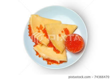 Plate of crepes with caviar isolated on white background Plate of crepes with caviar isolated on white background 74366470